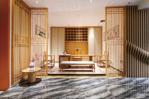How should the colour scheme for bespoke hotel furniture be designed?