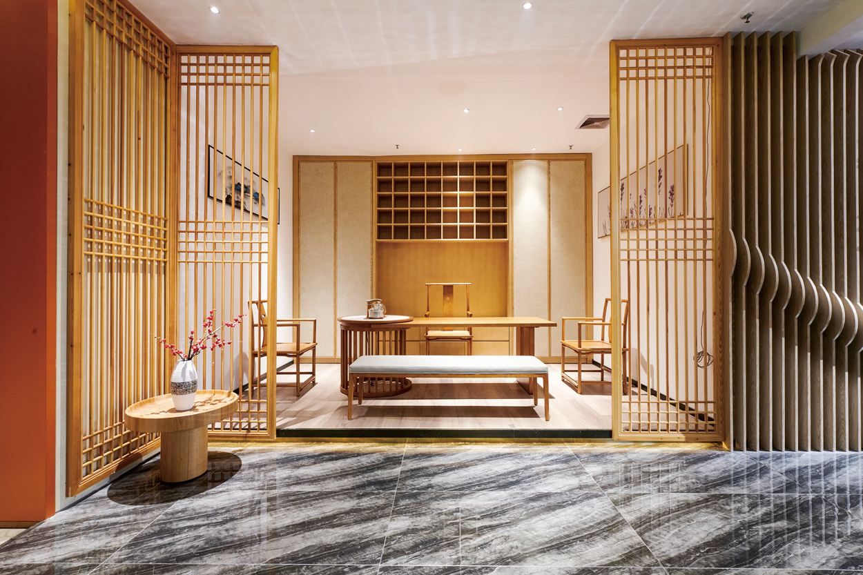 How should the colour scheme for bespoke hotel furniture be designed?